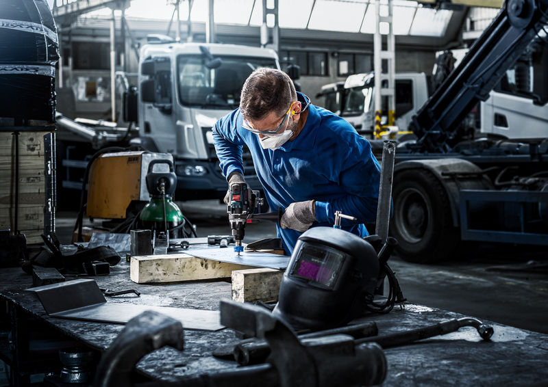 Produktbild Fabrik, Herstellung, Werkstatt, Handschuh, Elektrische Bohrmaschine