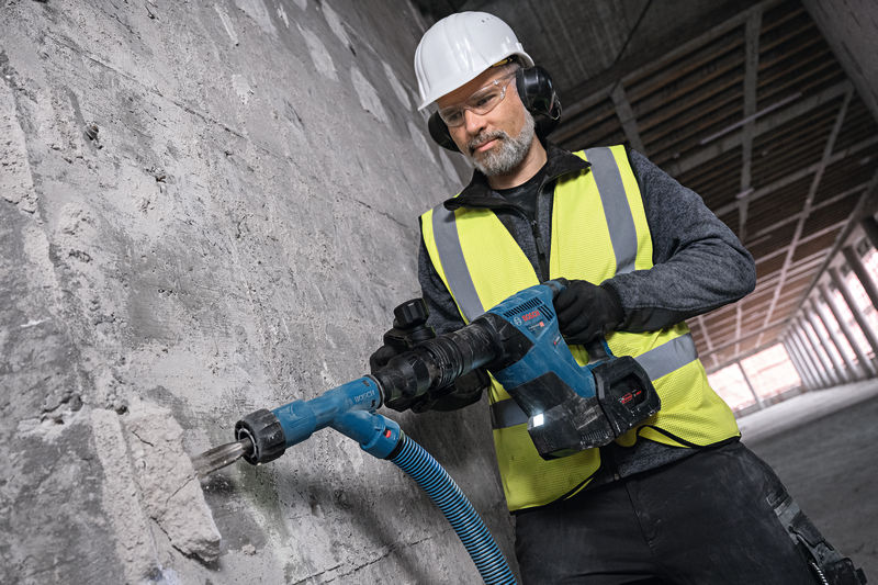 Person, Arbeiter, Kleidung, Handschuh, Elektrische Bohrmaschine
